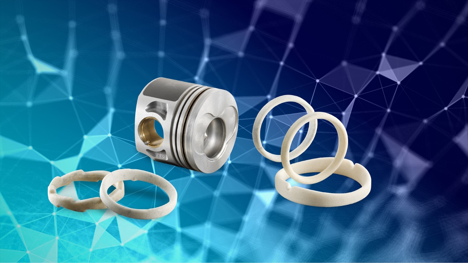 A silver piece of metal and several white Emil Müller GmbH salt cores against a blue background