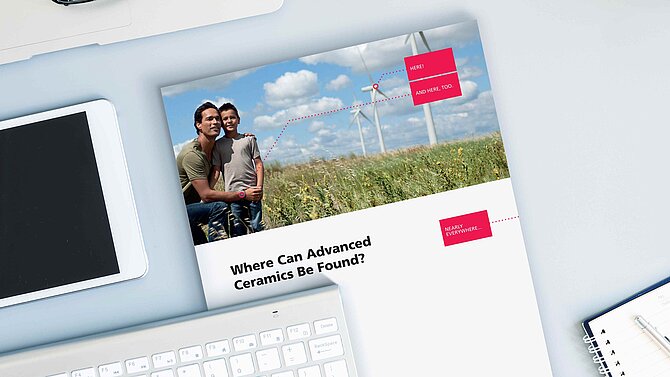 A CeramTec brochure lies on an office desk