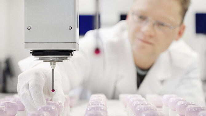 Man in the laboratory inspects CeramTec ceramics