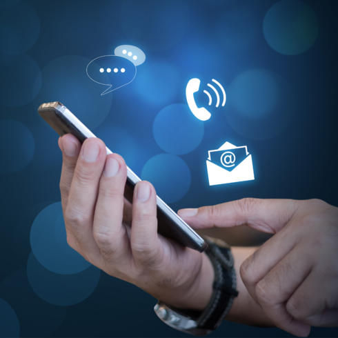 Male hand taps on smartphone