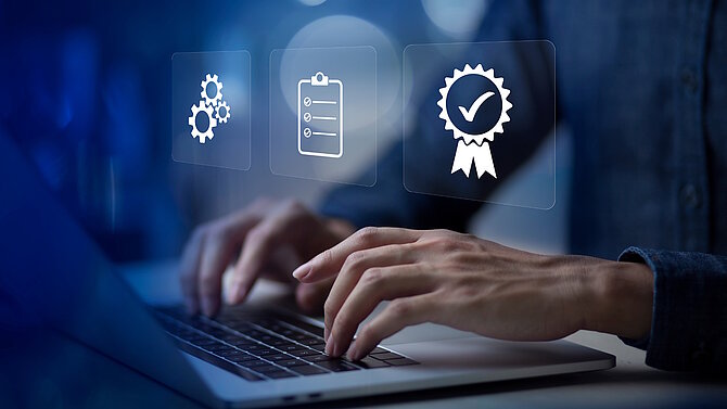 Two hands on a laptop and three symbols symbolise CeramTec's ESG certifications