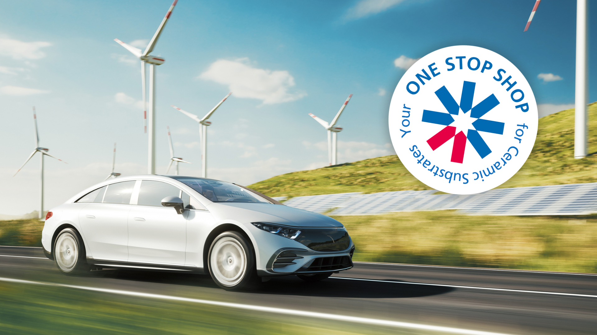 A modern electric car is driving on a country road, next to it the Substrate-One-Stop-Shop logo from CeramTec.